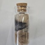 All colors of the hair is captured in a glass bottle as a memorial keepsake at our water cremation in Springfield, MO.