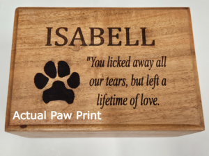 Custom engraved acacia pet memorial box featuring personalized inscription and actual paw print.