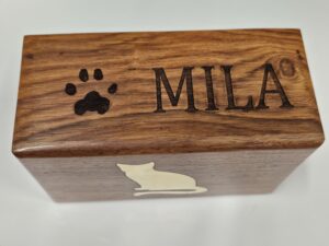 Custom pet aquamation memorial package with actual paw print engraved on the rosewood urn.