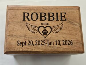 Handcrafted acacia wood pet memorial urn with laser-engraved heart with wings icon at Tranquil Tides for Springfield and Branson families.